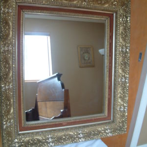 Elegant, gilded mirror