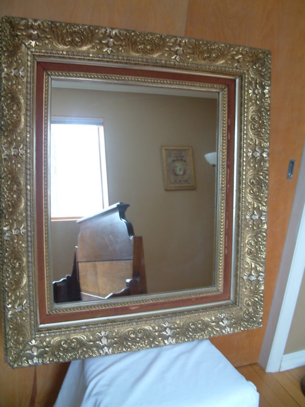 Elegant, gilded mirror